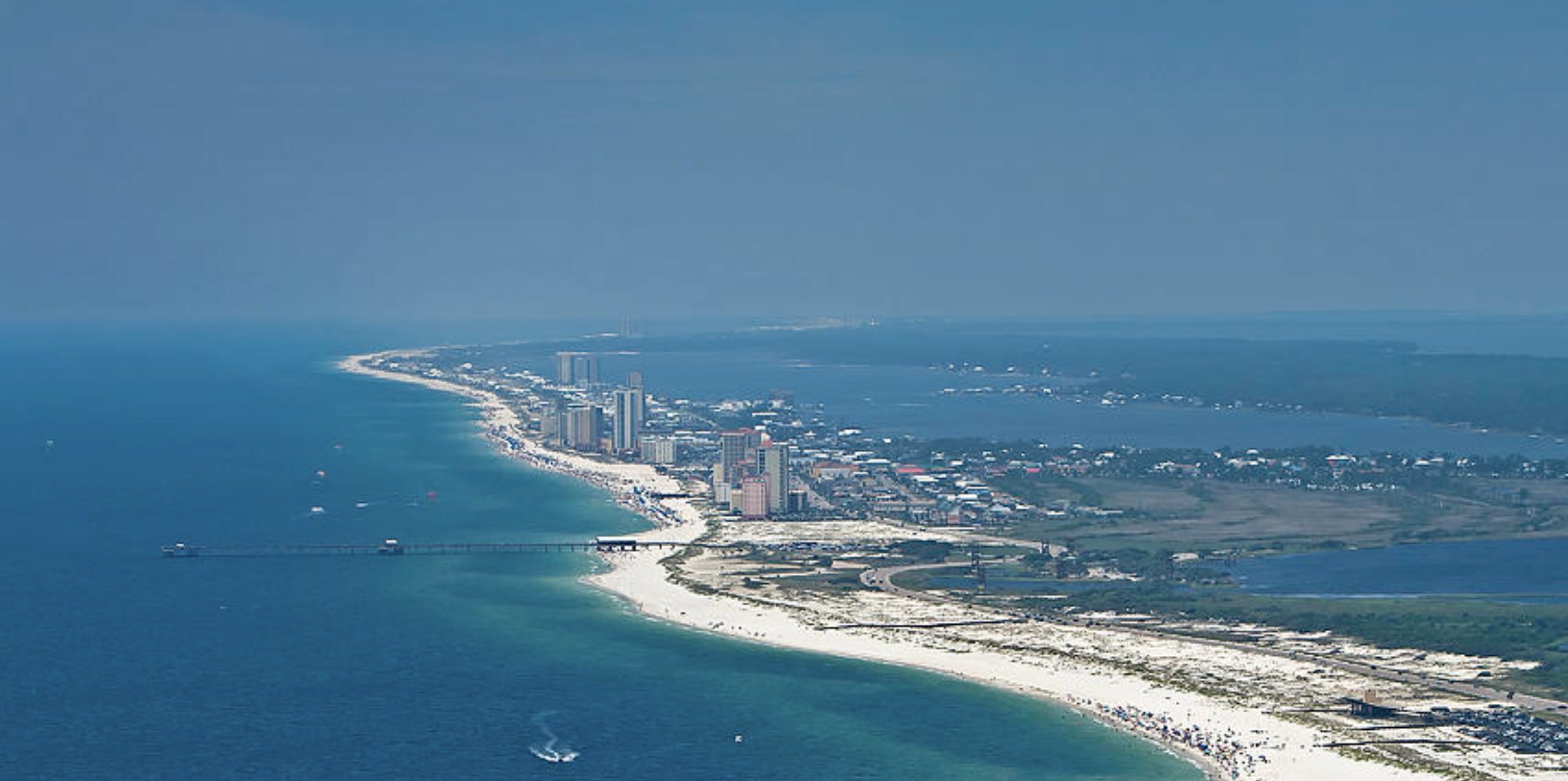 Aerial view of a Texas barrier island with open Gulf beyond