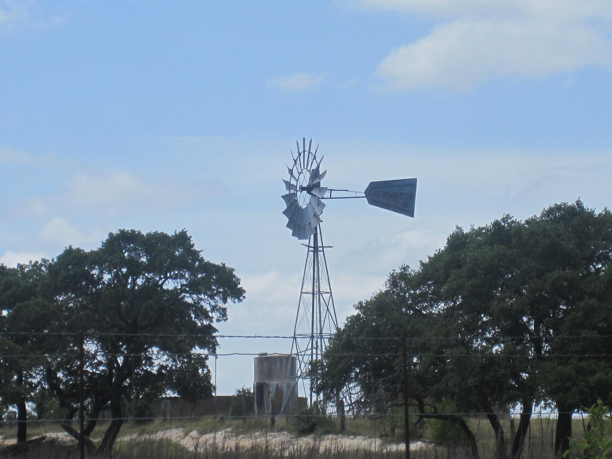 Hill Country windmill and stock tank